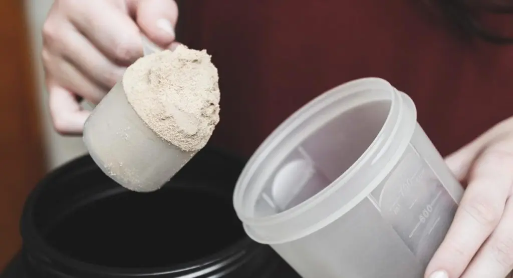 Pouring the Best Vegan Protein Powder
