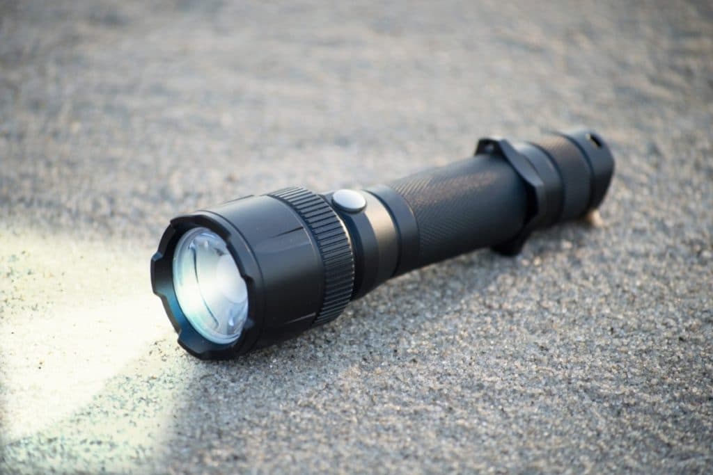 One of the Best Flashlights for Camping on a Bed of Sand