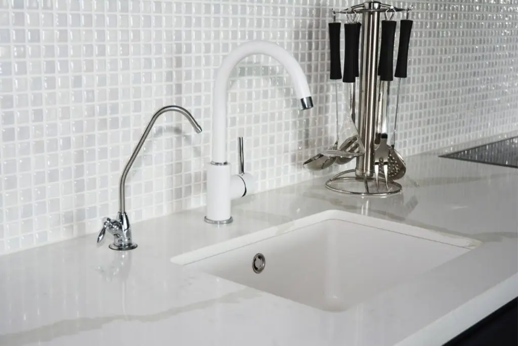 White Faucet on White Background
