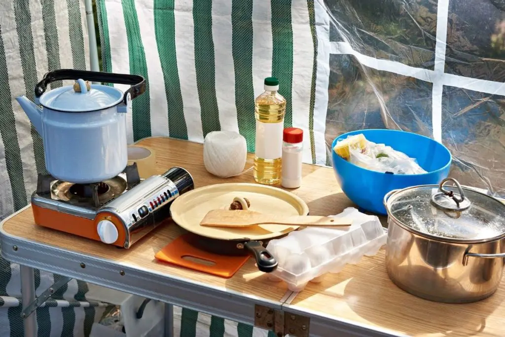 Cooking breakfast on one of the Best Camping Tables