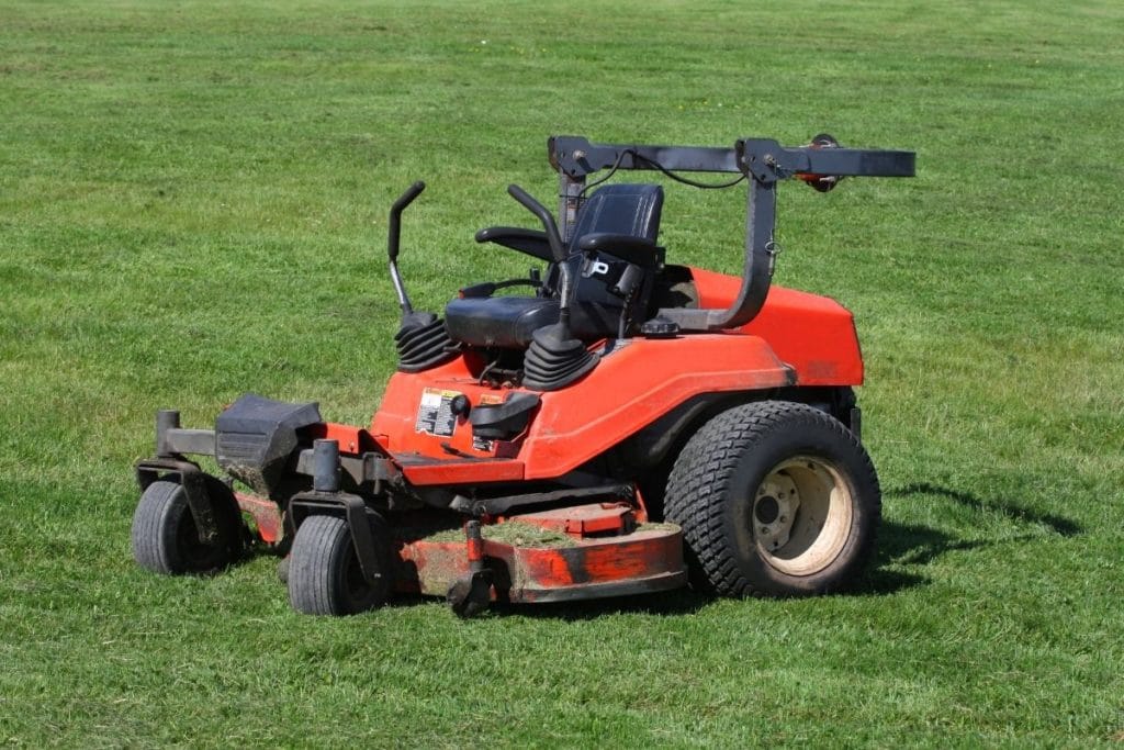 Red Riding Lawn Mower on a Grass Field