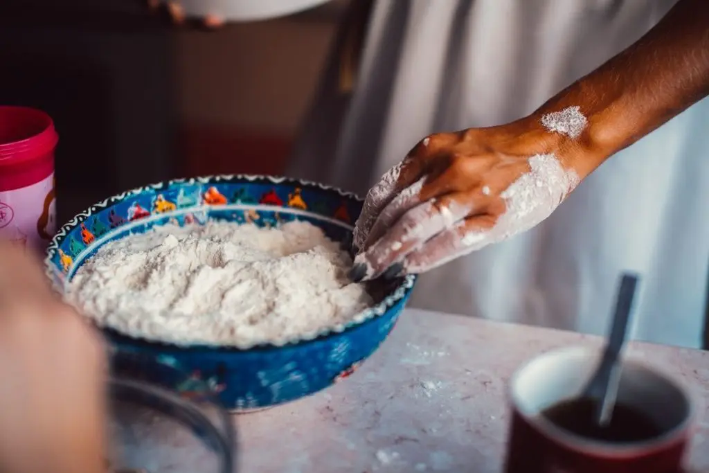 Woman Using Flour