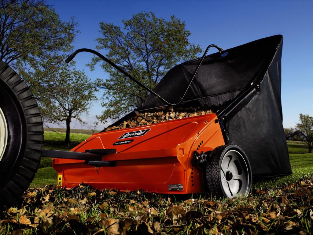 Orange Lawn Sweeper Full of Leaves