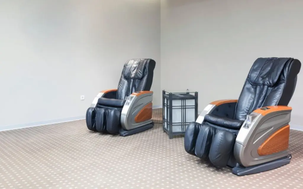 Two unused Full-Featured Massage Chairs in a room