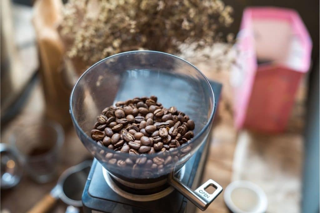 Preparing to make Espresso using full beans