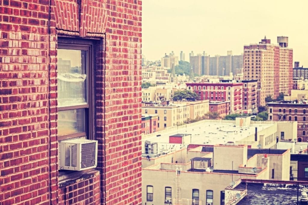 Using one of the best window air conditioners with heat in the city