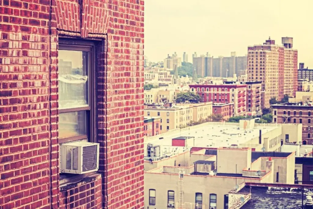 Using one of the best window air conditioners with heat in the city