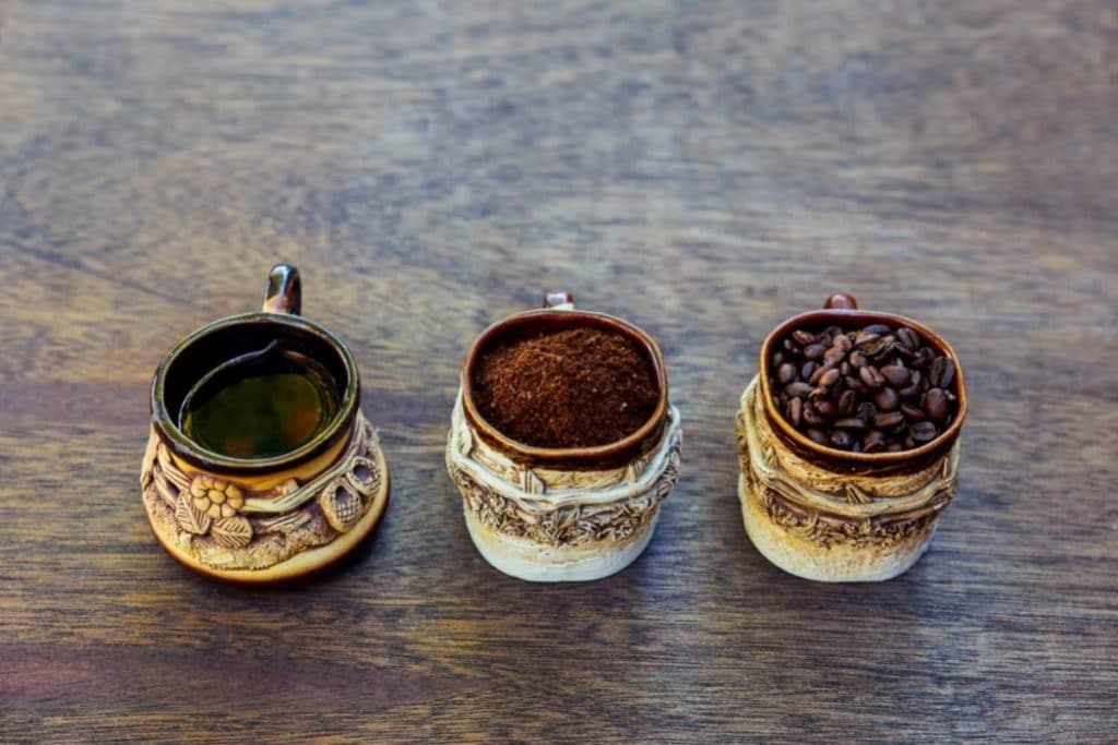 Three stages of coffee through the use of a manual coffee grinder