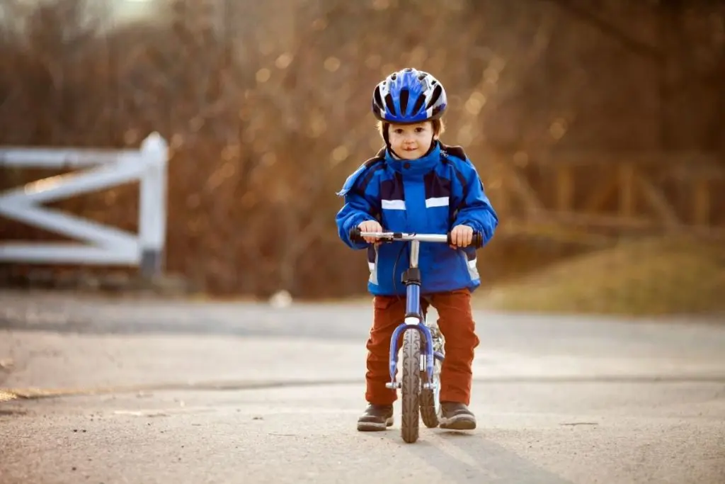 Child using one of the best balance bikes